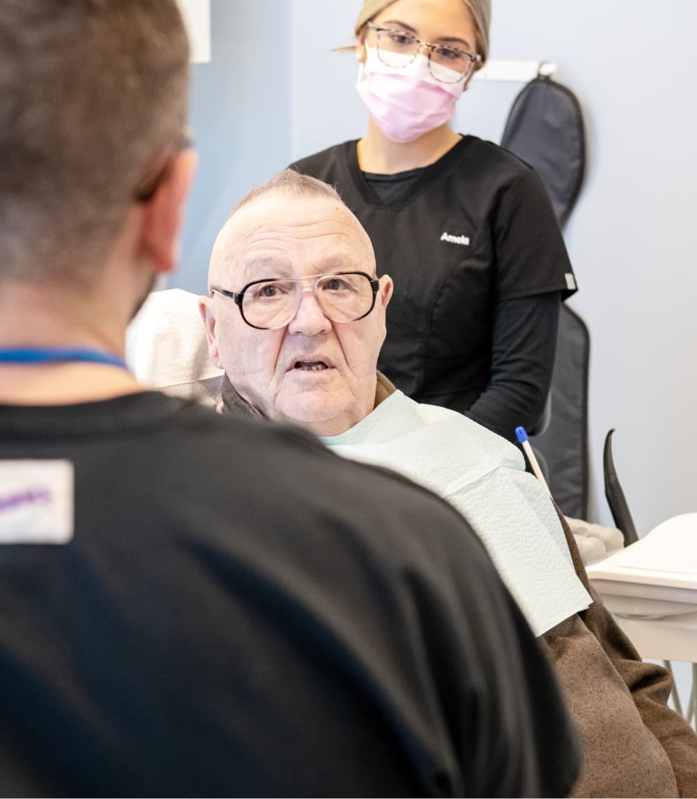 man smiling during dental visit