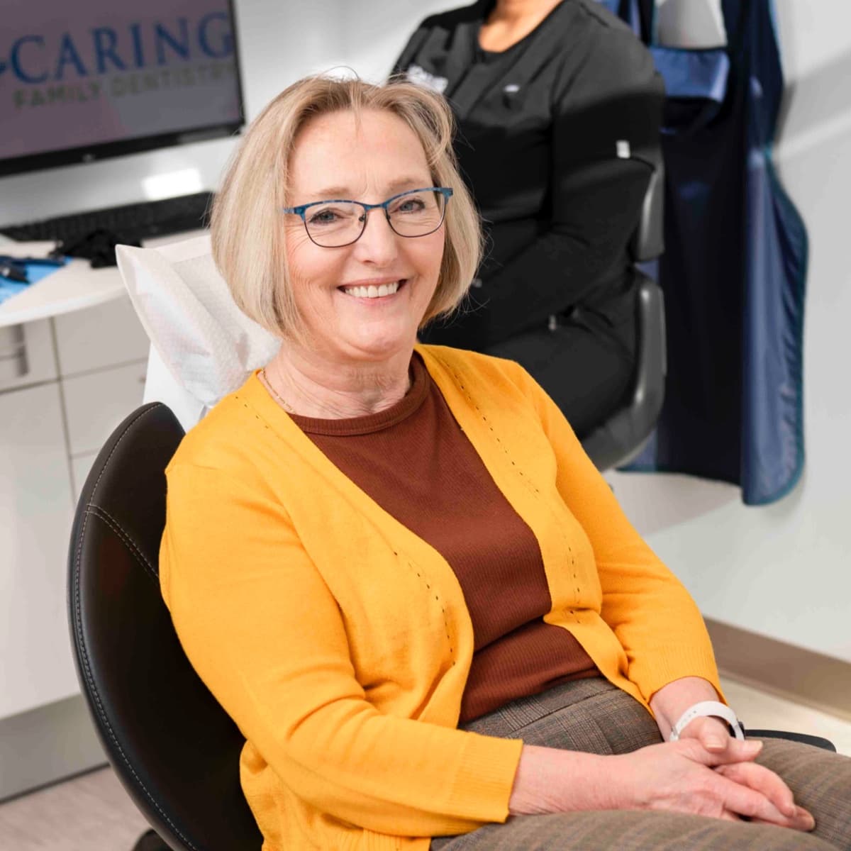 adult patient smiling during orthodontic visit